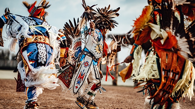 Dancers in native regalia.