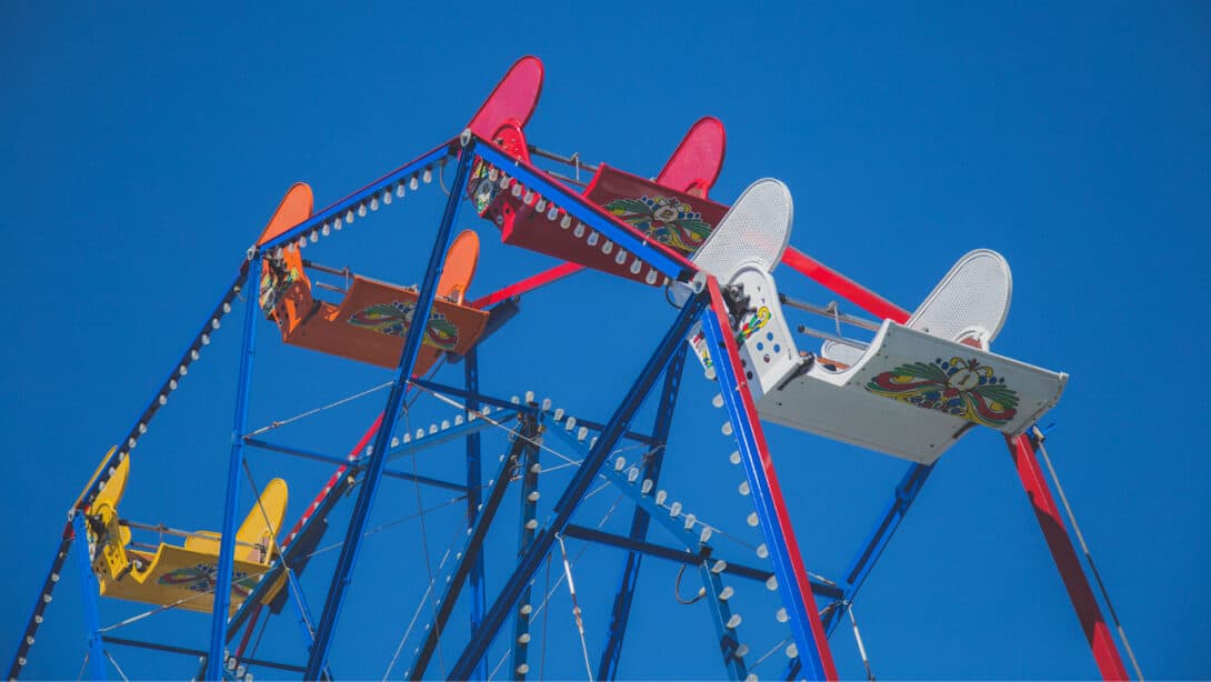 A Ferris Wheel going around.
